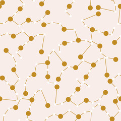 gold celestial elements in a seamless pattern design