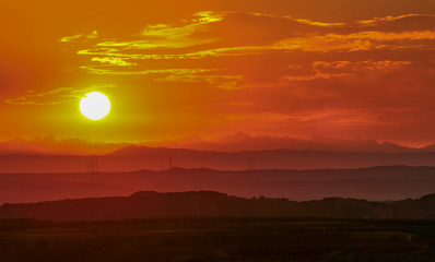 beautiful orange sunset with the mountains - Image