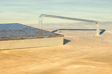  Skate track. Close up of a metallic ramp in a skate park. 