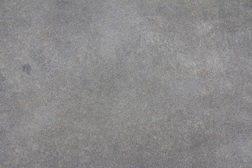 Sanded cement background. Smooth concrete surface. Polished grey stone texture.