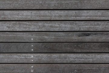 Weathered wooden plank floor texture. Wood pavement background. Abstract home deck pattern