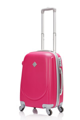 red plastic wheeled suitcase with handle isolated on white