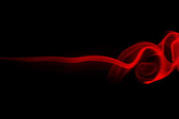 Fire of red smoke abstract on black background, darkness concept
