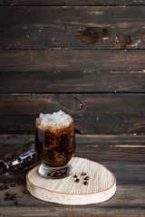 Cold frappuccino with cream and ice crumb