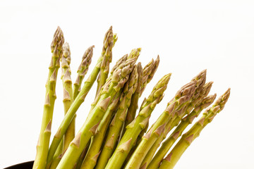 Bundle of green asparagus. Close up image with copy space.