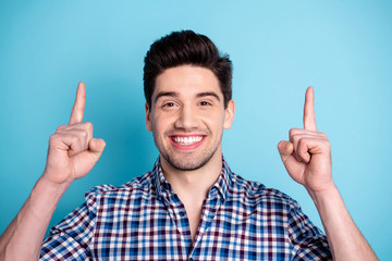 Close up photo amazing he him his macho white teeth wonder indicate up empty space index fingers...