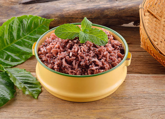 Rice on a wooden background