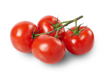 A bunch of fresh organic tomatoes isolated on white background. Full depth of field.