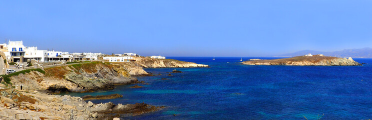 Tip of the peninsula of Diakoftis, facing the chapel Saint George (Agios Georgiou), in Mykonos, island of Cyclades in the heart of the Aegean Sea