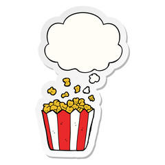 cartoon popcorn and thought bubble as a printed sticker