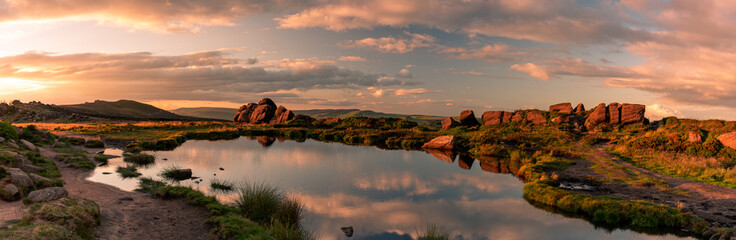 Doxey Pool reflections, and sunset at The Roaches, in the Peak District National Park,...