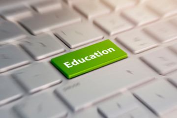 education concept - keyboard with education button. inscriptions on the grey silver keyboard button...