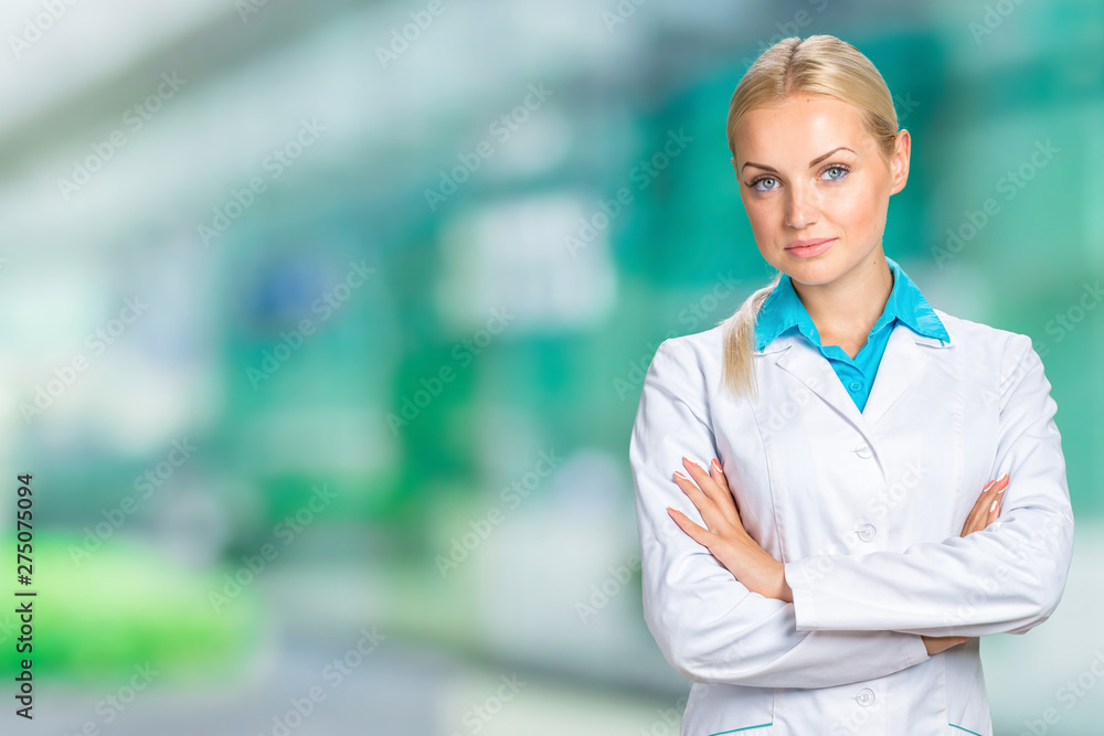 Poster Portrait of happy smiling confident glad beautiful with blonde hair female family doctor wearing white coat