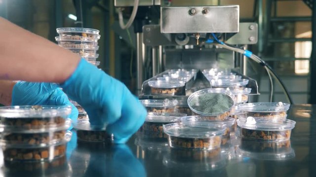 Boxes with bread crumbs are getting piled up together