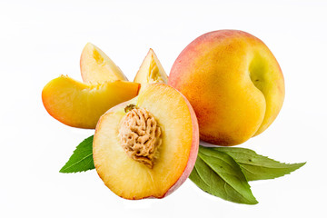 Fresh organic peaches isolated on white background