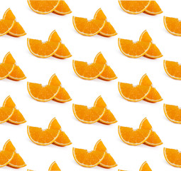 Colorful fruit pattern of fresh orange slices on  background. From top view