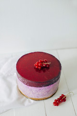 Chef cooking ceesecake with currant. Selective focus. New York Cheesecake.