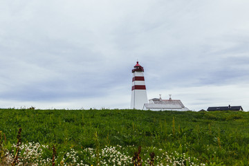 Fototapeta na wymiar Alnes lighthouse at godoy island near alesund; norway