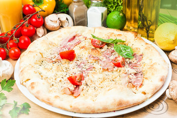 Delicious Pizza on Wooden Board close up