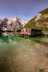 Lake Braies also known as Pragser Wildsee  in beautiful mountain landscape. Relaxing and recreation at Lago di Braies in Dolomites, South Tyrol, Italy, Europe.