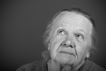 Portrait of elderly woman. Thoughtfulness. Toned