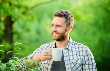Naklejka na ściany i meble morning coffee. healthy lifestyle. nature and health. drink tea outdoor. ecological life for man. man in green forest. breakfast refreshment time. happy man with cup of tea. Good morning coffee