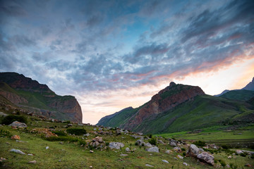 View of beautiful mountains in northern caucasus with cloudy sky