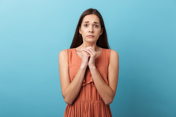 Cute lovely young girl standing isolated