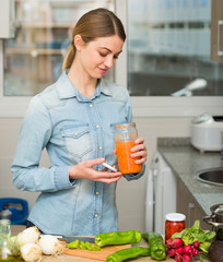 Woman cooking with pickled carrot