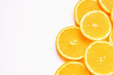 Fresh bright round orange slices. Shades of orange. Flat lay, top view, bright design. Fruit composition. Concept of vitamin C, healthy wholesome food.