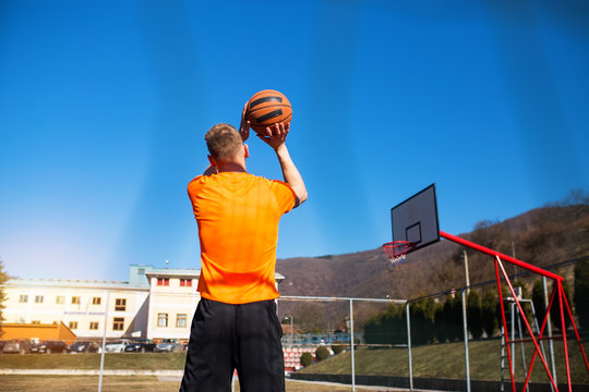 Basketball player on a training outdoor