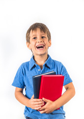 Obraz premium Happy pupil schoolboy with books on white background.