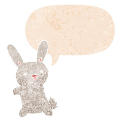 cartoon rabbit and speech bubble in retro textured style