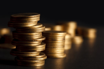 Stack of Gold Coin on Black Background.