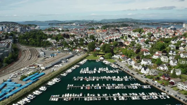 Boats and Yachts Marina Cinematic Drone Pull Back Aerial in Stavanger Oil Industry Capital of Norway