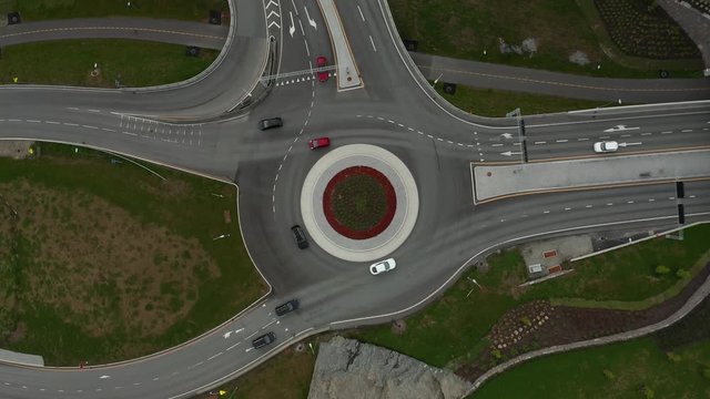 Cinematic Bird Eye View Rotating Drone Aerial of Roundabout on Highway Intersection