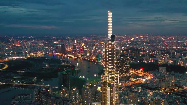 Aerial view of Downtown district of Ho Chi Minh City, aka Saigon, on sunset , including architectural landmark during daytime, South Vietnam
