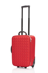 red wheeled colorful suitcase with handle isolated on white