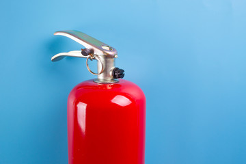 fire extinguisher on blue background