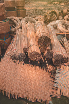 Materials and equipment of thai OTOP product from dry Catathea grass weave as basketry.