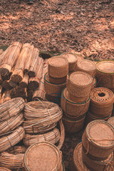 Materials and equipment of thai OTOP product from dry Catathea grass weave as basketry.