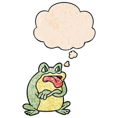 grumpy cartoon frog and thought bubble in grunge texture pattern style
