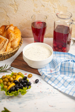 Dovga, yayla, caucasian soup made from yogurt and served with olives. 