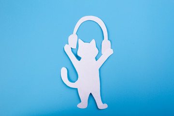 Cute kitten and headphones.