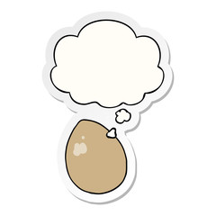 cartoon egg and thought bubble as a printed sticker