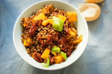 Pumpkin with lentils, sun dried tomatoes and basil 