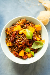 Pumpkin with lentils, sun dried tomatoes and basil 