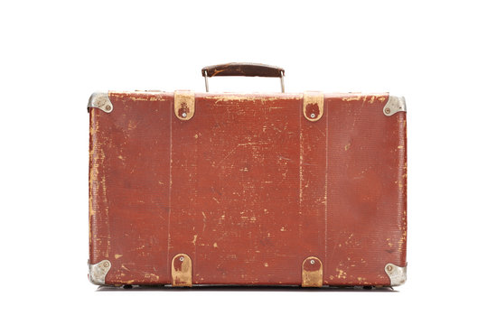 weathered brown vintage suitcase isolated on white