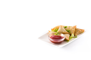 Samsa or samosas with meat and vegetables isolated on white background . Traditional Indian food. Copyspace