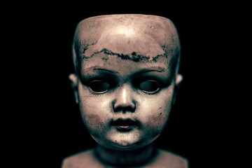 Creepy doll in the dark 
